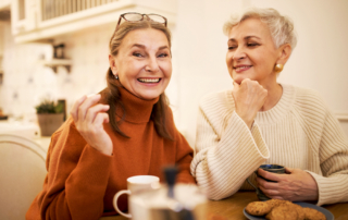 Two women having coffee at the senior living in Sacramento